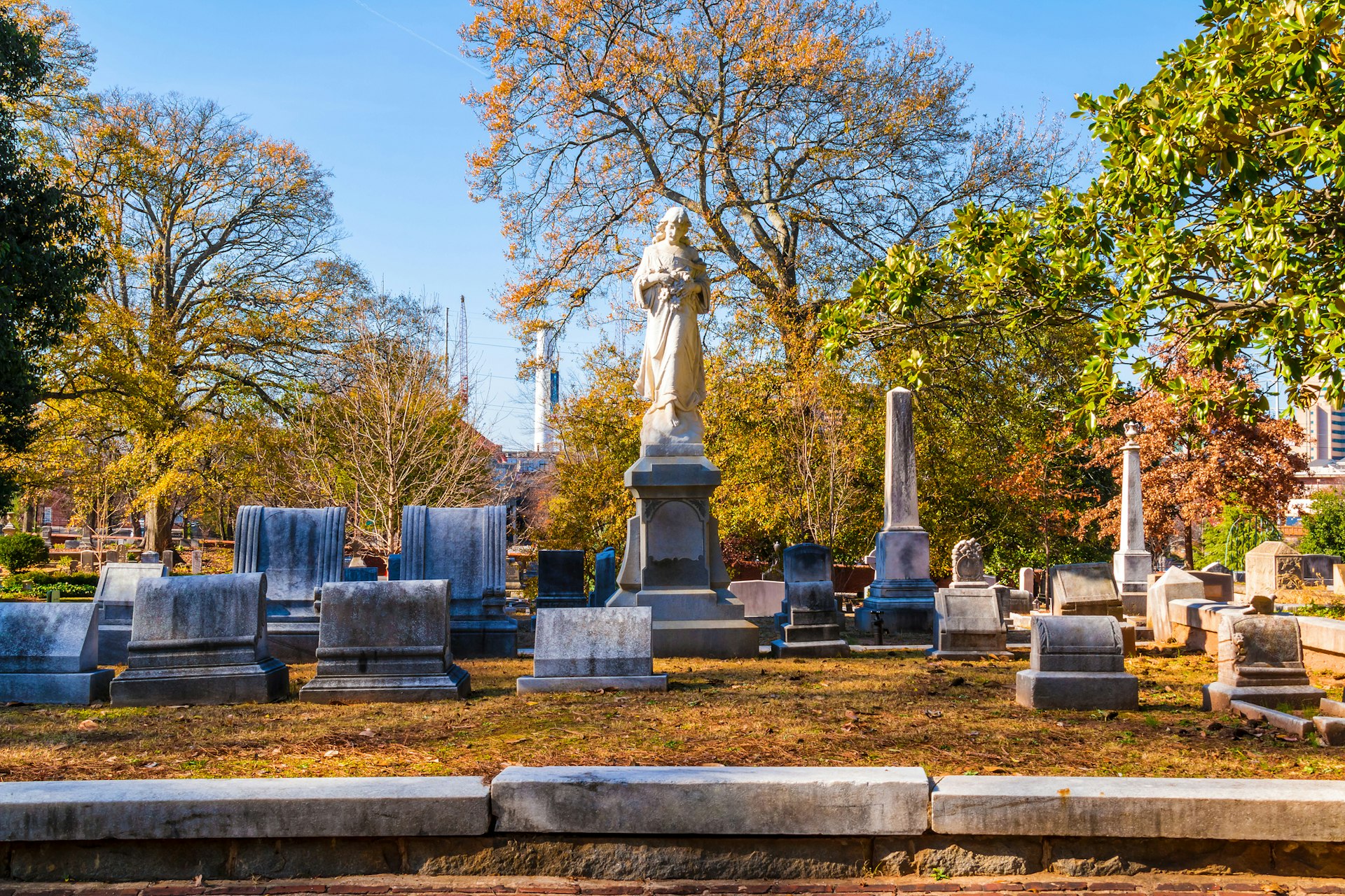 Group of tombstones and sculpture on Oakland Cemetery, Atlanta, USA