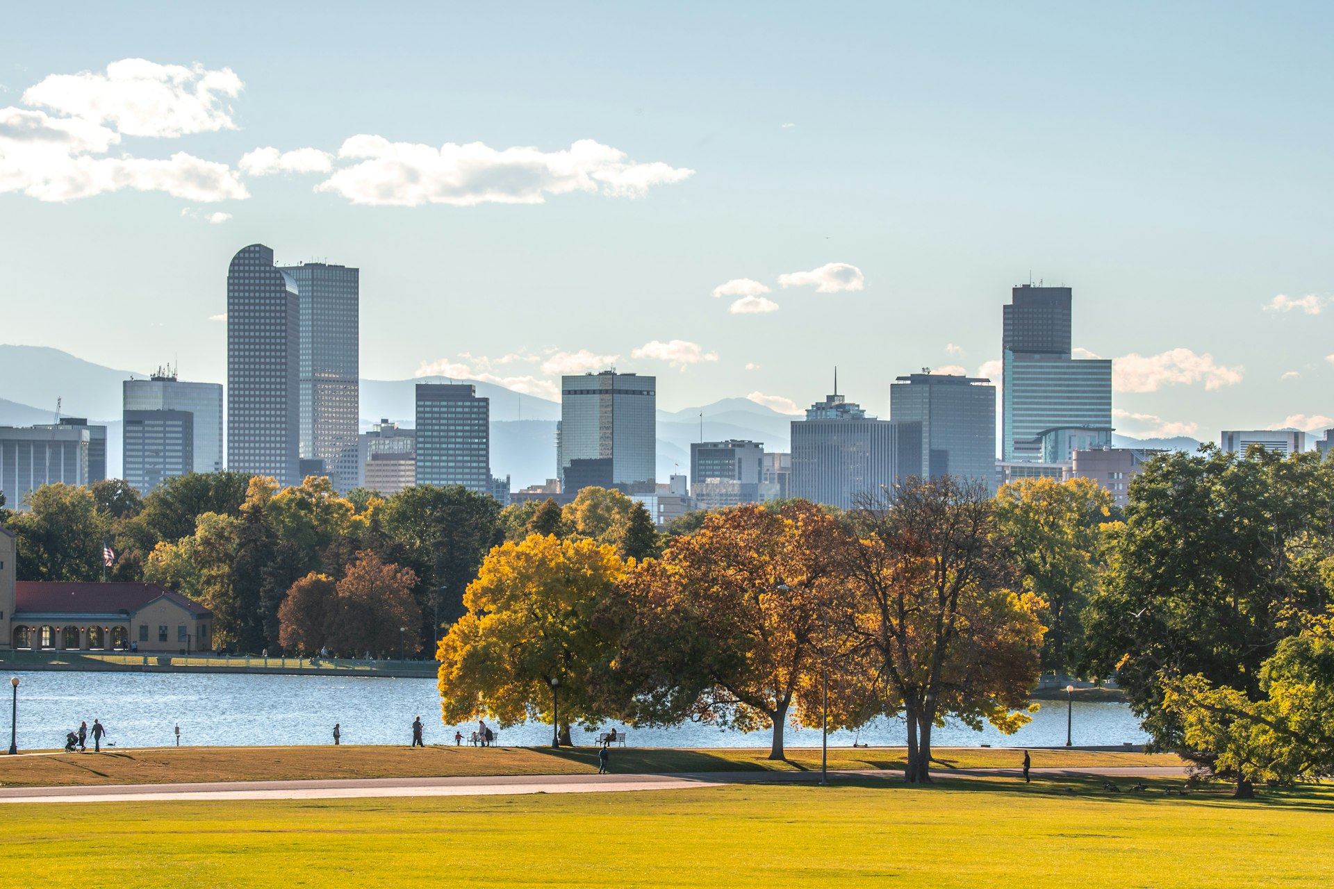 Trees And Buildings In City Against Sky