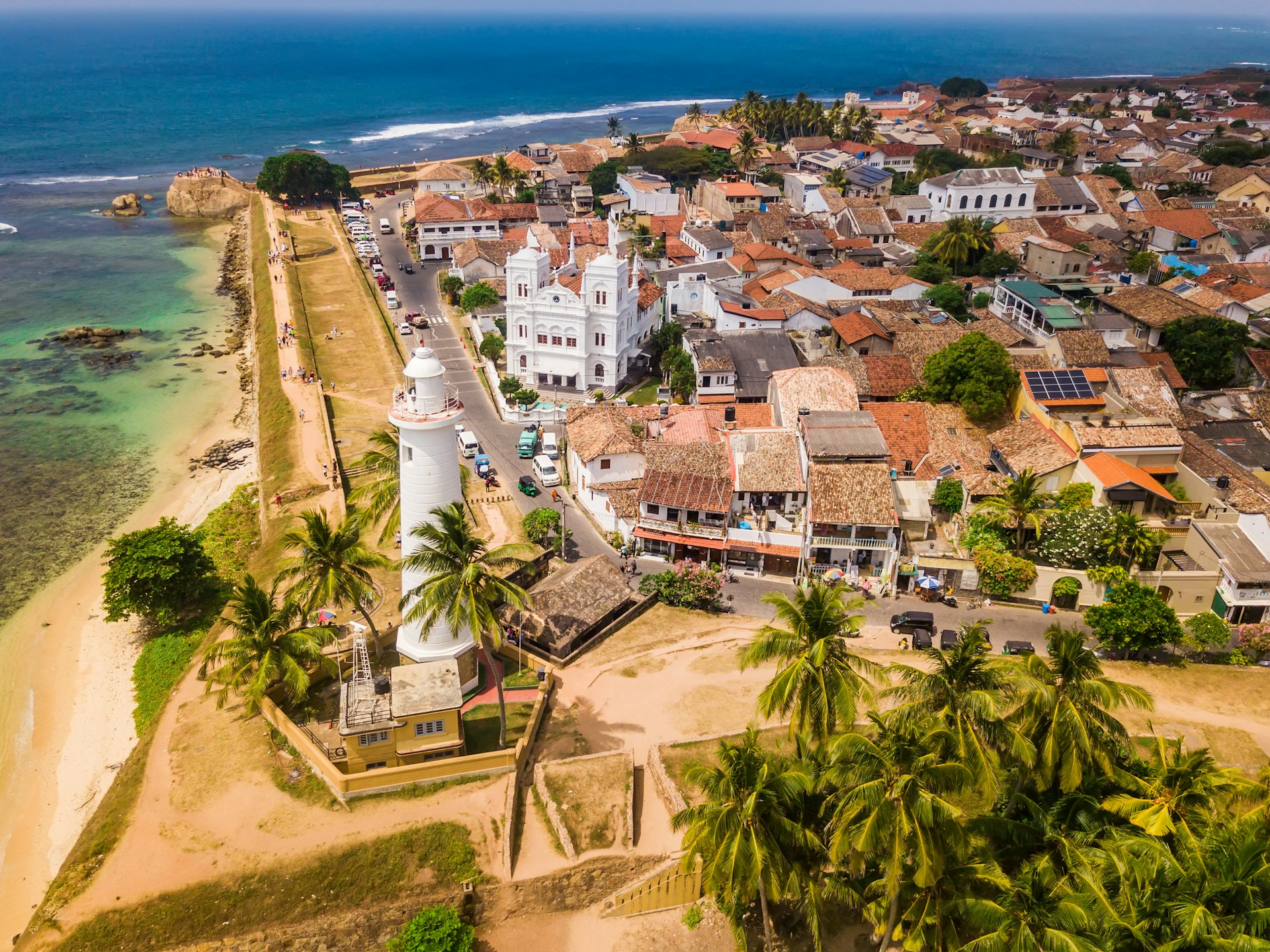 A beachside fort with a tall watch tower