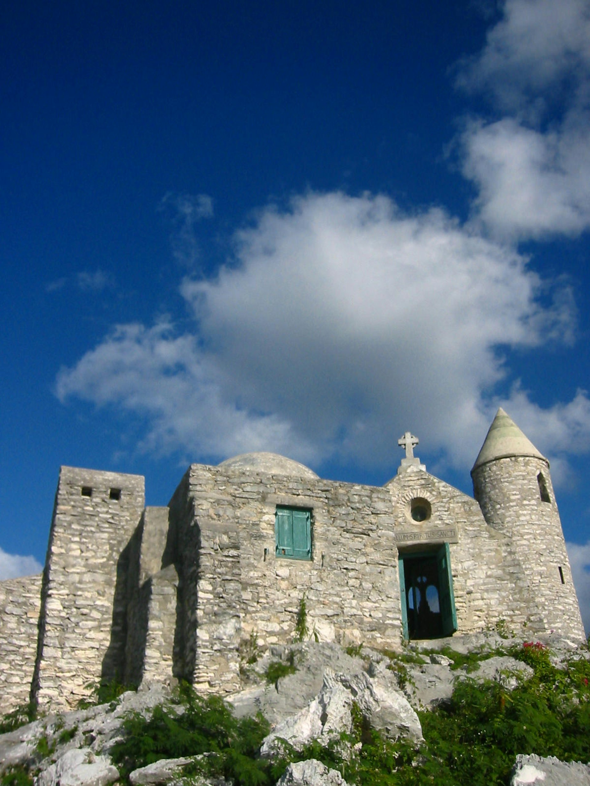 Exterior view of a stone church that sits atop of Mount Alvernia on Cat Island, Bahamas 