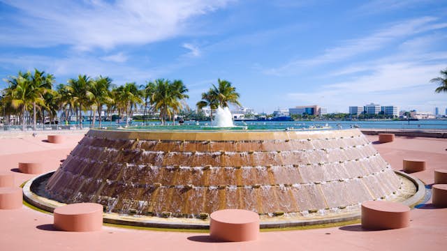 Fountain at Bayfront Park in the downtown area of Miami, FL with Biscayne Bay in the distance.