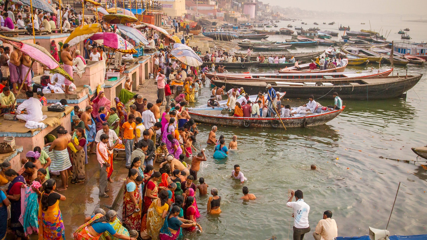 Varanasi, India - March 21: Hindu pilgrims take holy bath in the river ganges on the auspicious Maha Shivaratri festival on March 21, 2013 in Varanasi, Uttar Pradesh, India