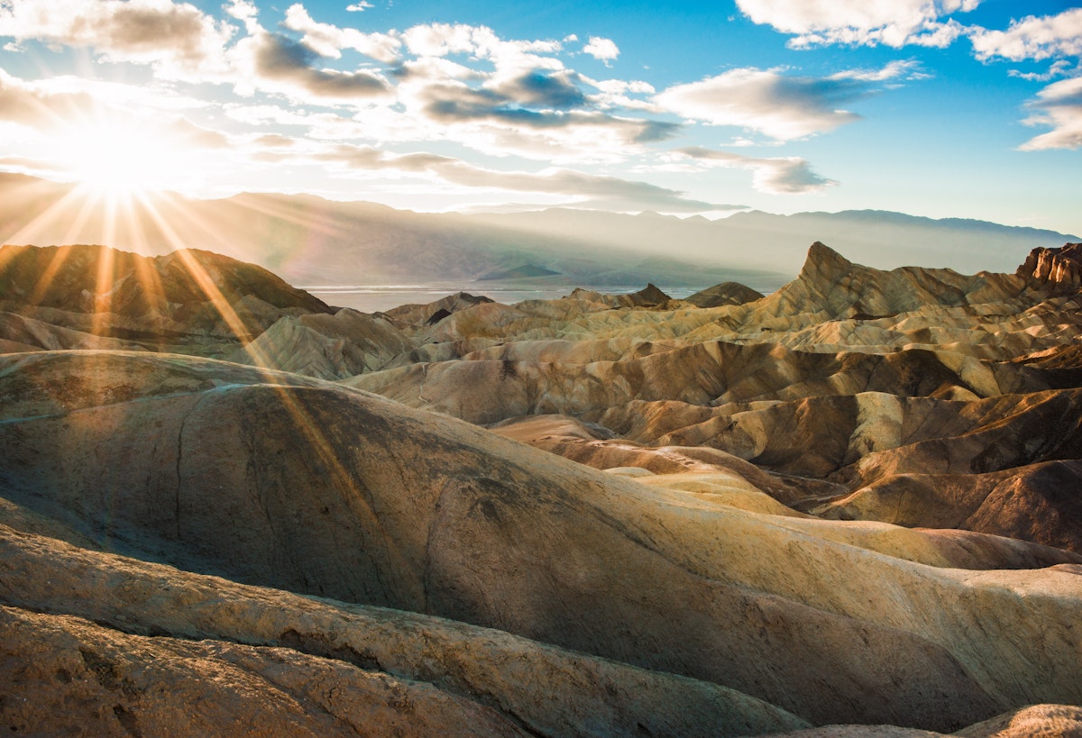 USA, California, Inyo County, Death Valley National Park, Zabriskie Point trail at sunset
