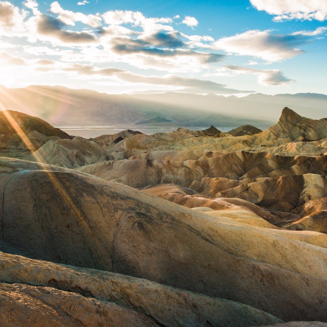 USA, California, Inyo County, Death Valley National Park, Zabriskie Point trail at sunset