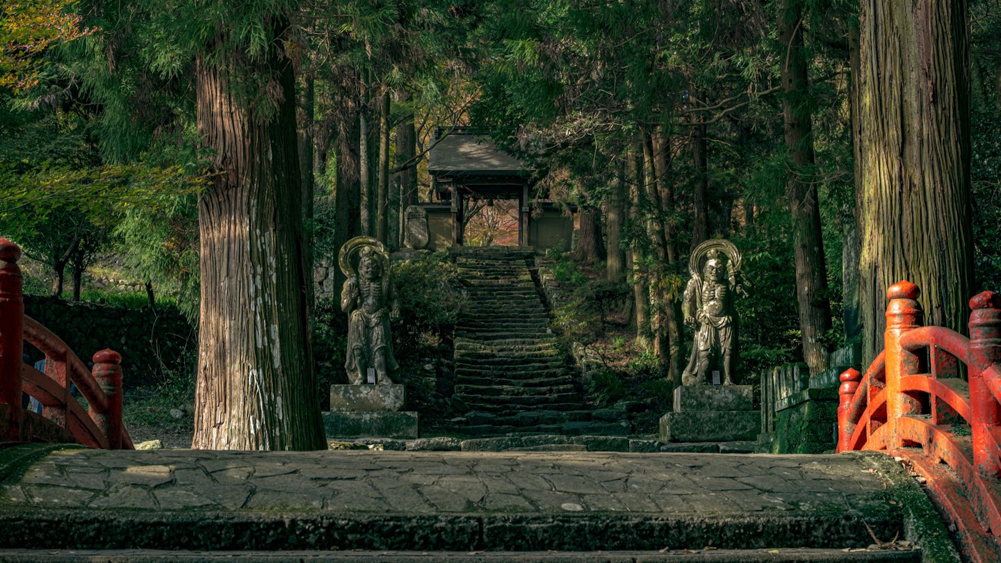 Stone Niou at the entrance to Futago-ji; Shutterstock ID 1558266038; Your name (First / Last): Ben N Buckner; GL account no.: 65050; Netsuite department name: Online Editorial; Full Product or Project name including edition: Kyushu History