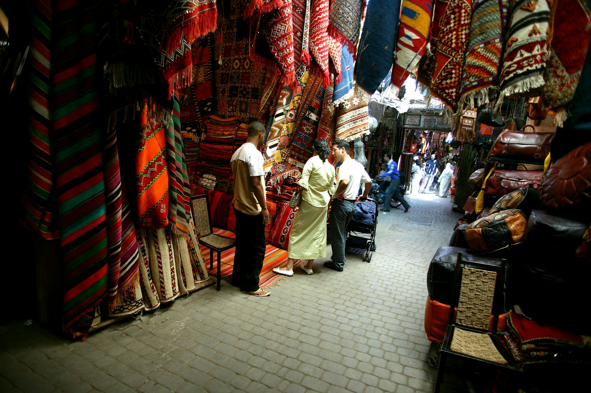 Rug sellers outside Criee Berbere, the carpet market in Marrakesh, Morocco