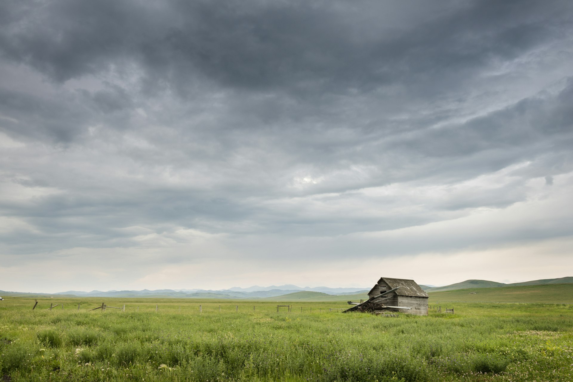 Old barn in prairie at Bar U Ranch.