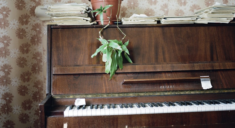 Red October piano, Ust-Nera.  In the decade following the Russian Revolution, this state-owned brand was distributed all over Russia, with the Red October factory producing nearly 20,000 pianos. After perestroika, the old art of Russian piano-making fell away. The Red October factory closed in 2004.