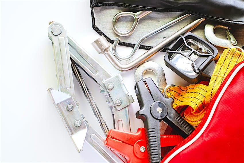 Car emergency kit on white background for vehicle and transportation concept Car emergency kit on white background for vehicle and transportation concept