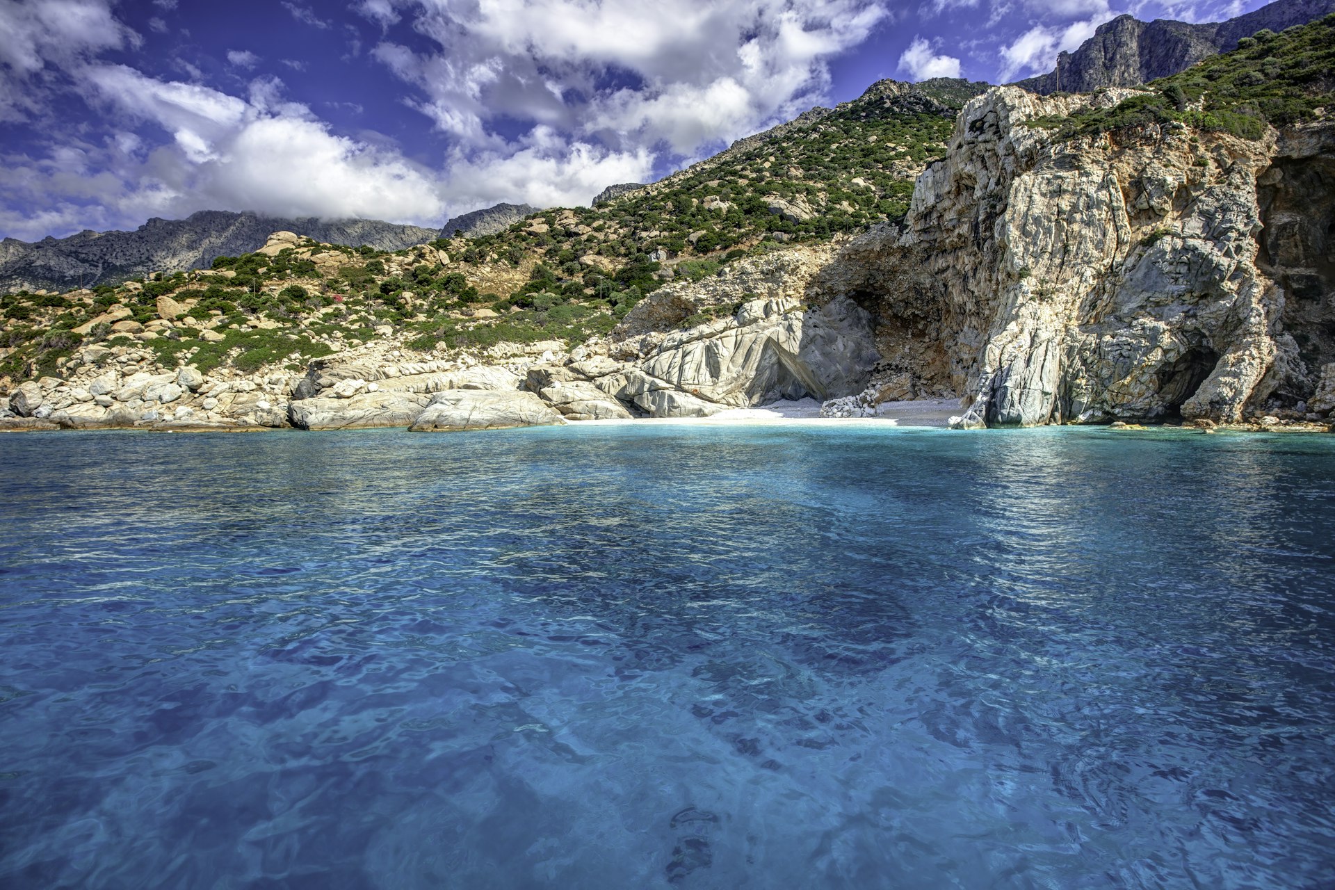 The beach of Seychelles, with transparent turquoise waters, in Ikaria island, Greece