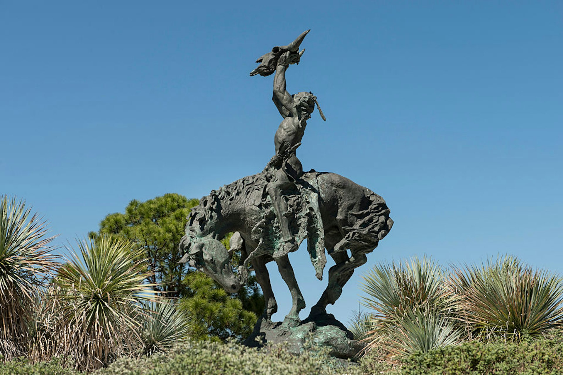 One of seven castings of sculptor Buck McCain bronze Invocation scupture, which stands outside the S