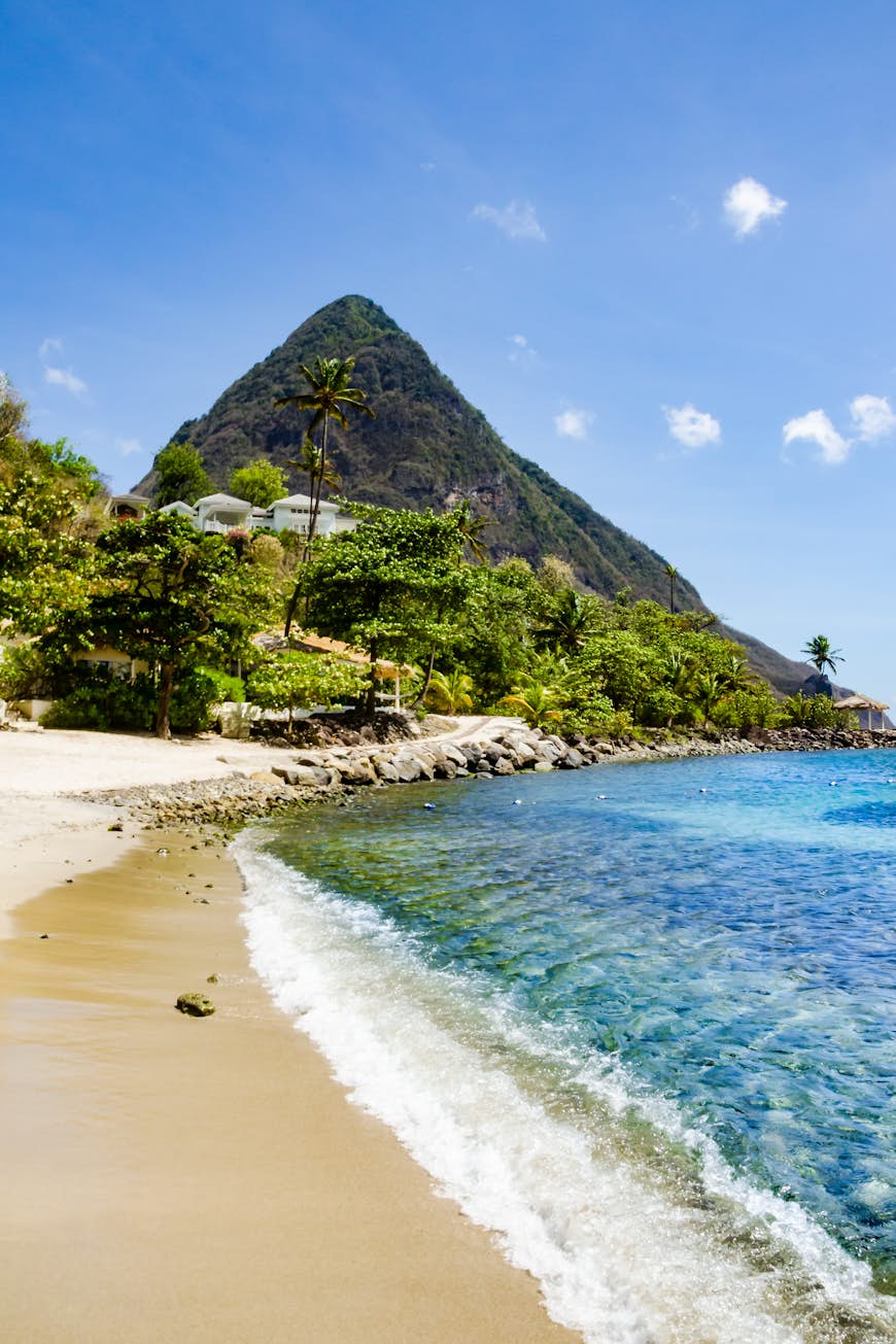 View of Piton Mountains in the distance with Sugar Beach in the foreground