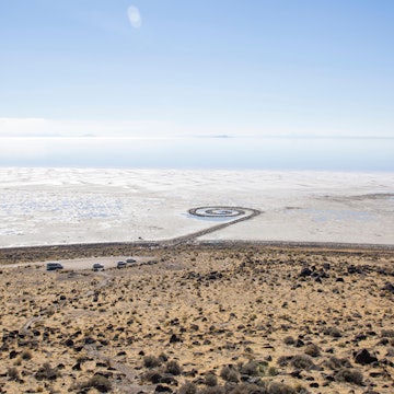 TTRHT1 Aerial view of Spiral Jetty against blue sky during sunny day