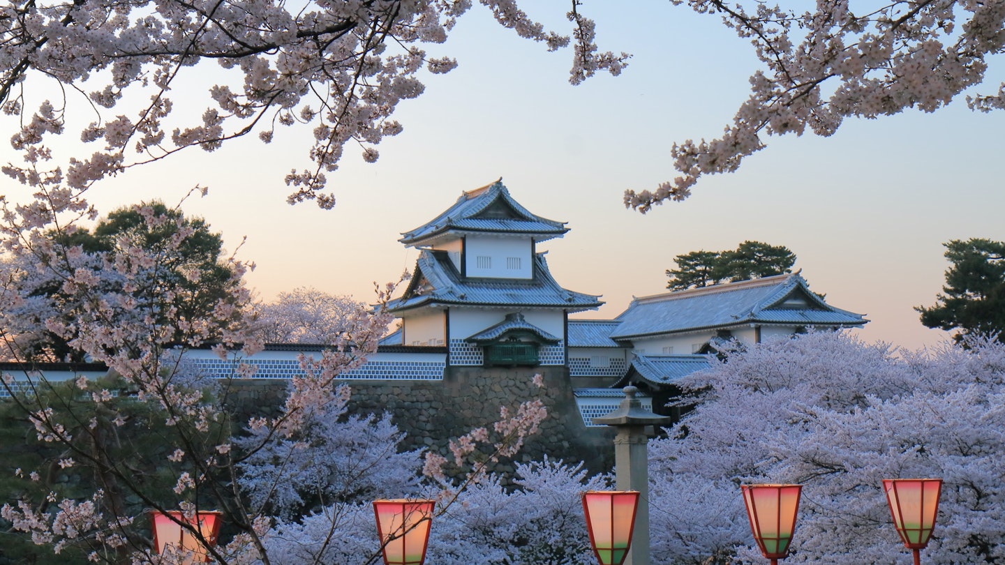 Cherry blossom and Kanazawa castle in Kanazawa Japan; Shutterstock ID 619821536; Your name (First / Last): Ben Buckner; GL account no.: 65050; Netsuite department name: Online Editorial; Full Product or Project name including edition: Japan Three Star Road