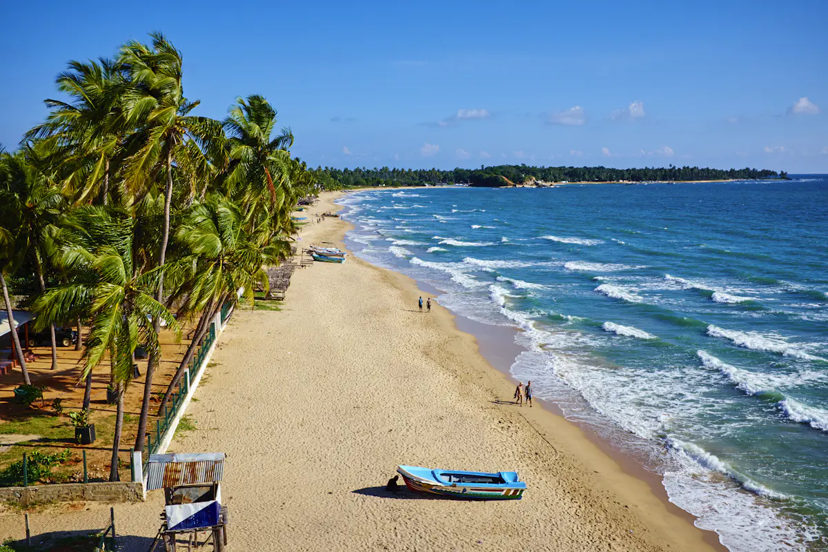 Uppuveli Beach 3km golden sand calm clear water snorkelling east coast guesthouses Trincomalee Sri Lanka