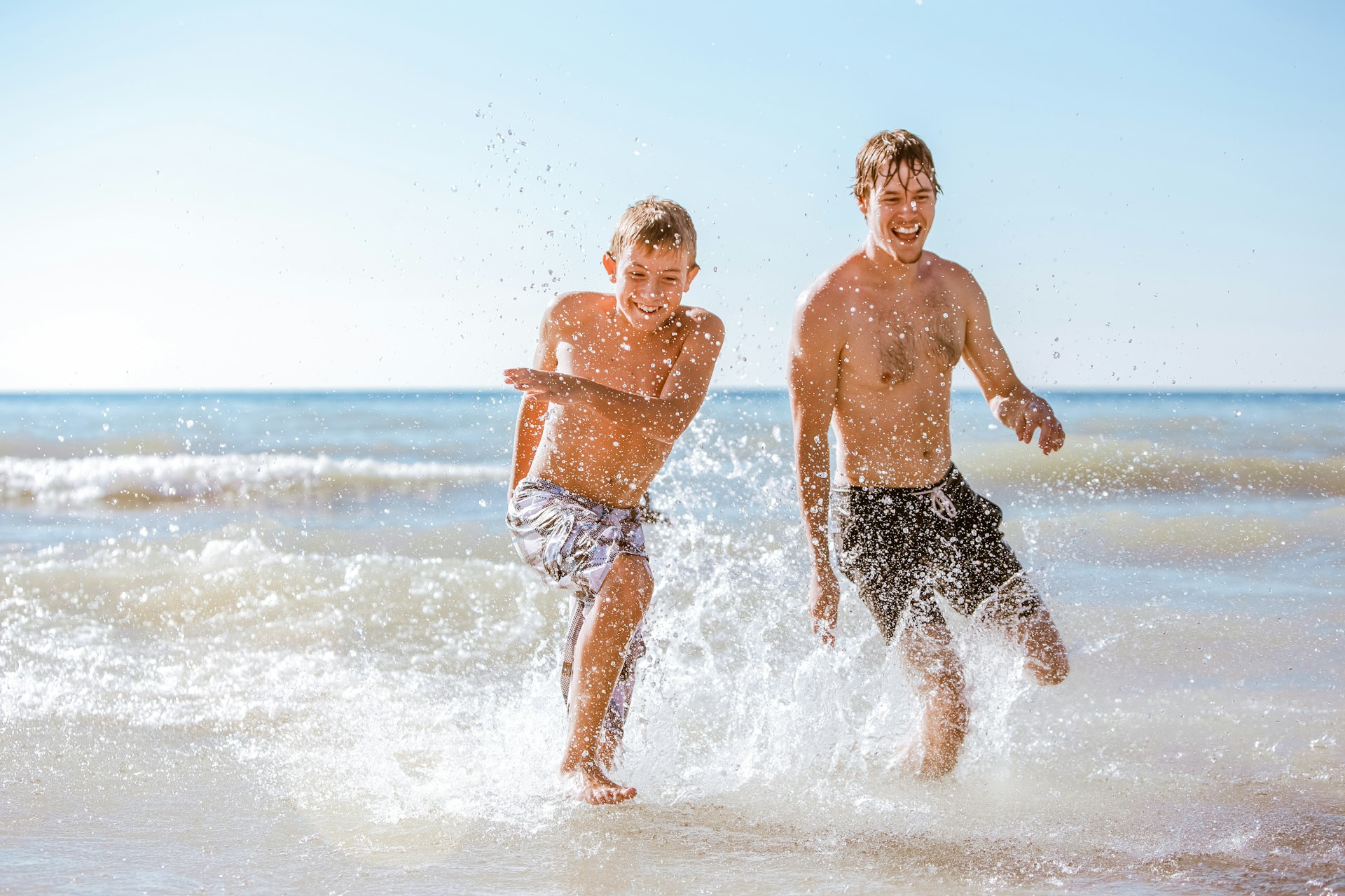 father and son playing in Lake Michigan.jpg