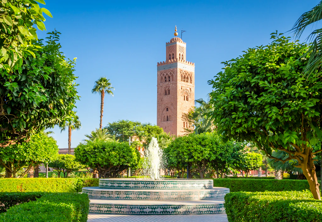 Koutoubia Gardens in Marrakesh, Morocco Fountain of Koutoubia Gardens with the Koutoubia Mosque minaret in the background