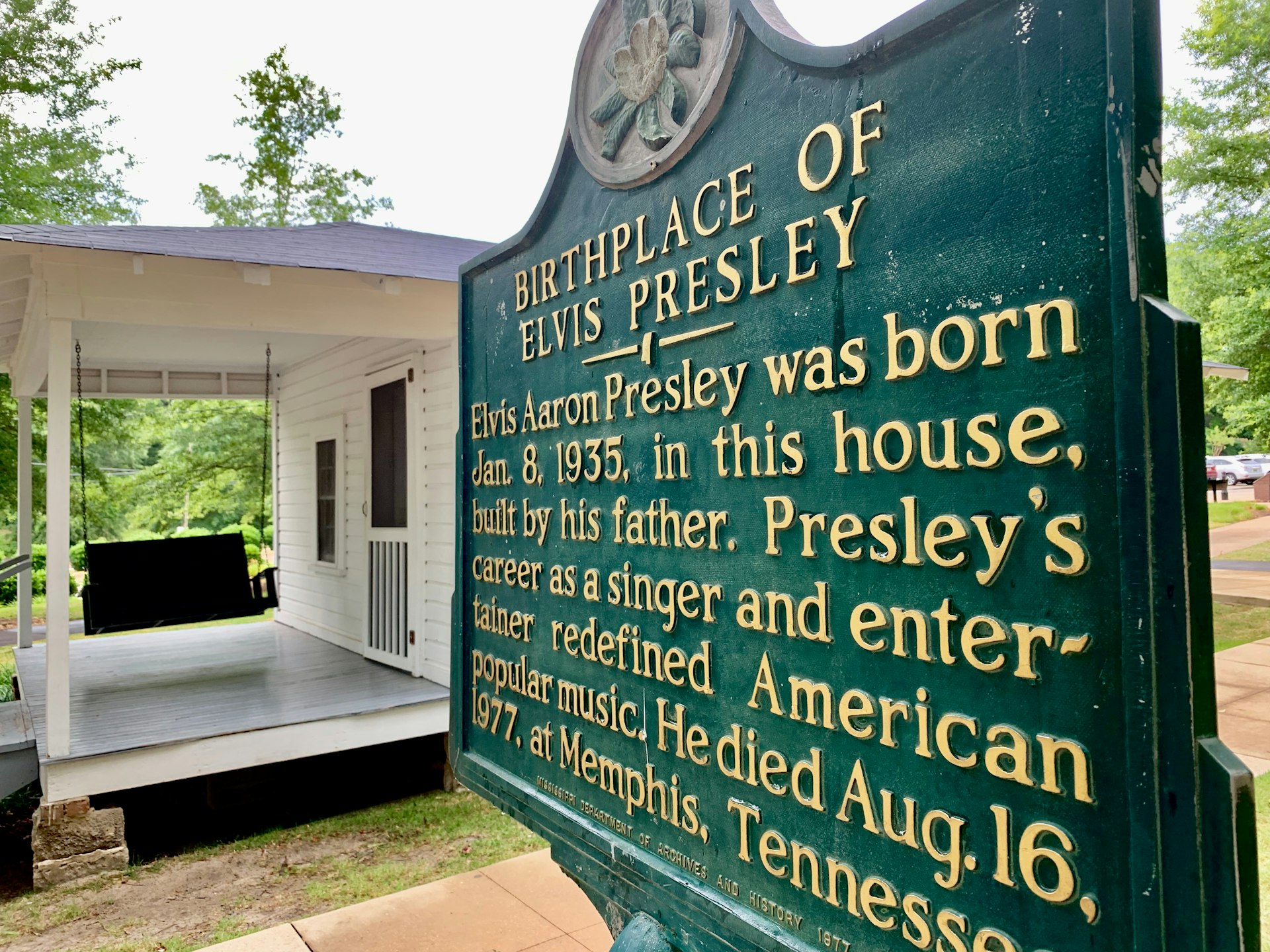 A closeup of a sign showing the birthplace of Elvis Presley in the Mississippi town of Tupelo.