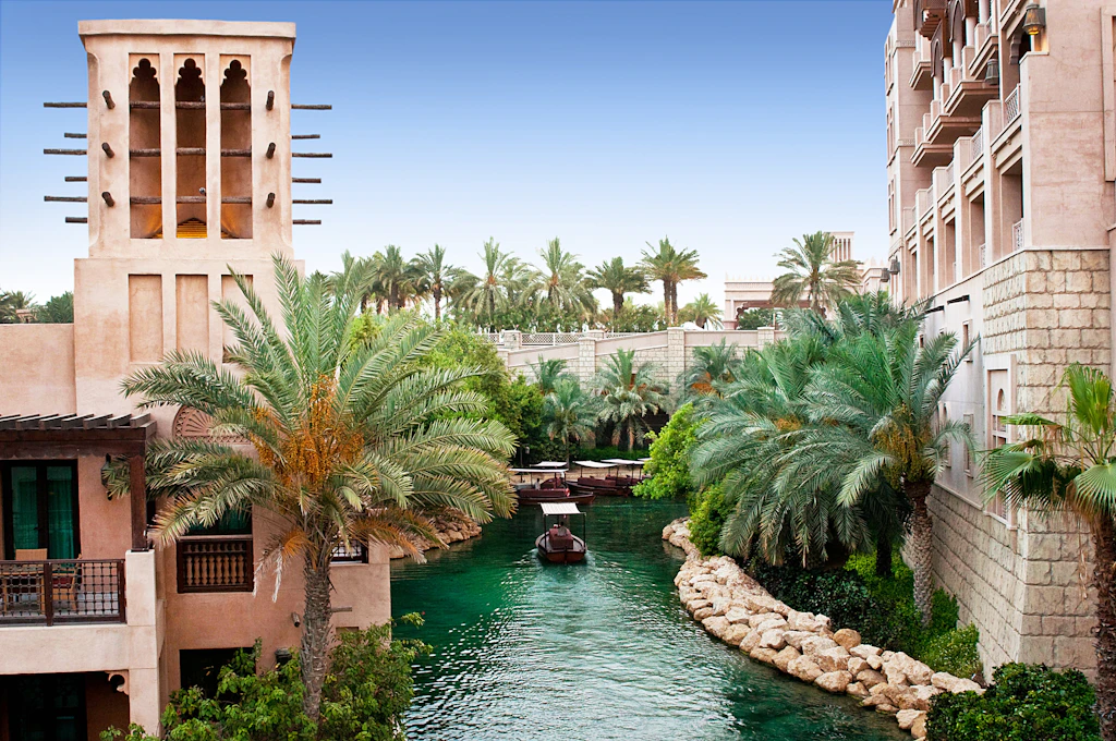 An abra floats through the waterway at Madinat Jumeirah in Dubai