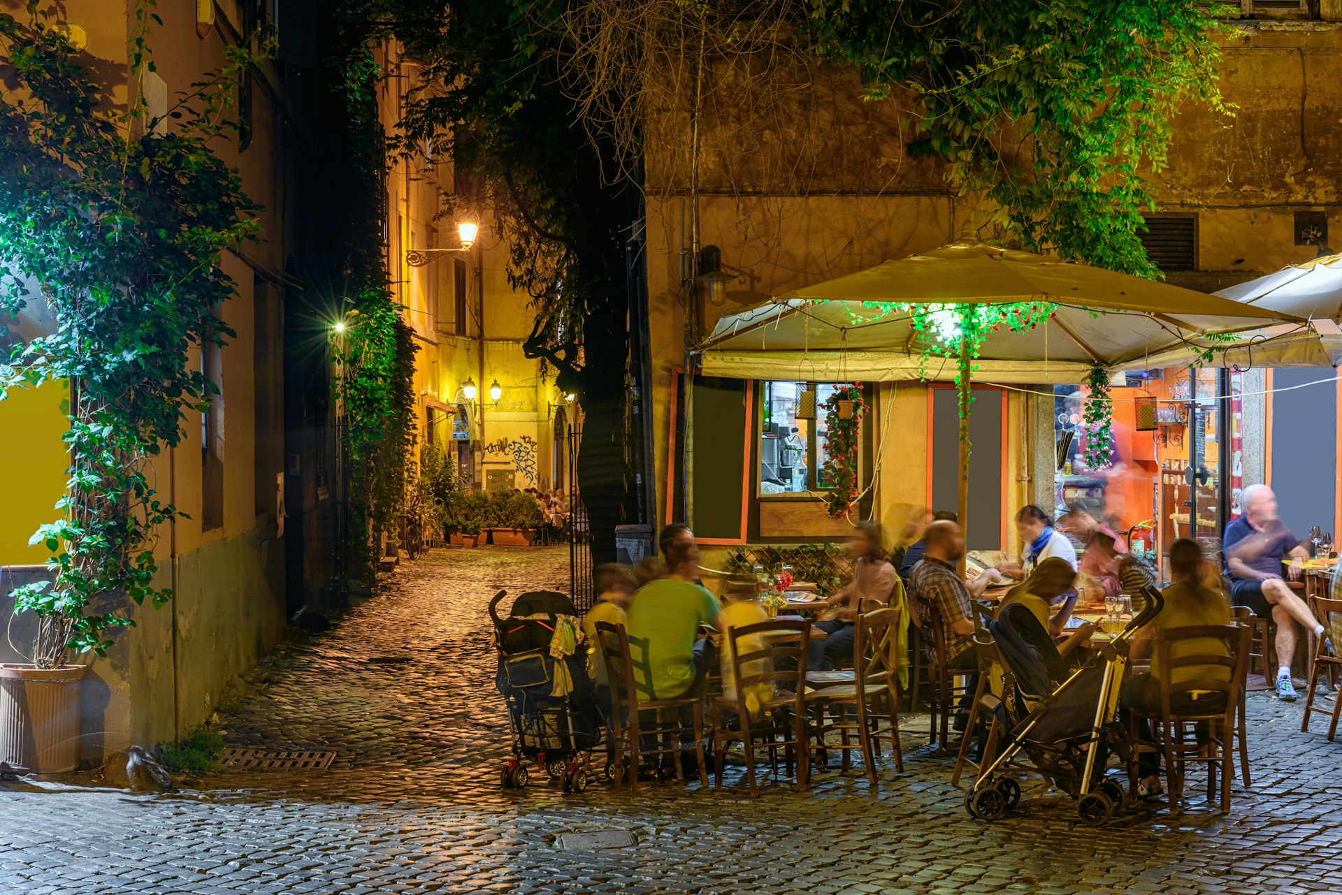 Night view of old street in Trastevere in Rome, Italy