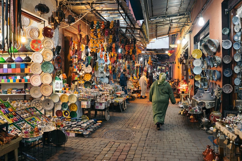 MARRAKESH, MOROCCO - JANUARY 3, 2017: Moroccan woman in the souk near the square of Jemaa el-Fna.