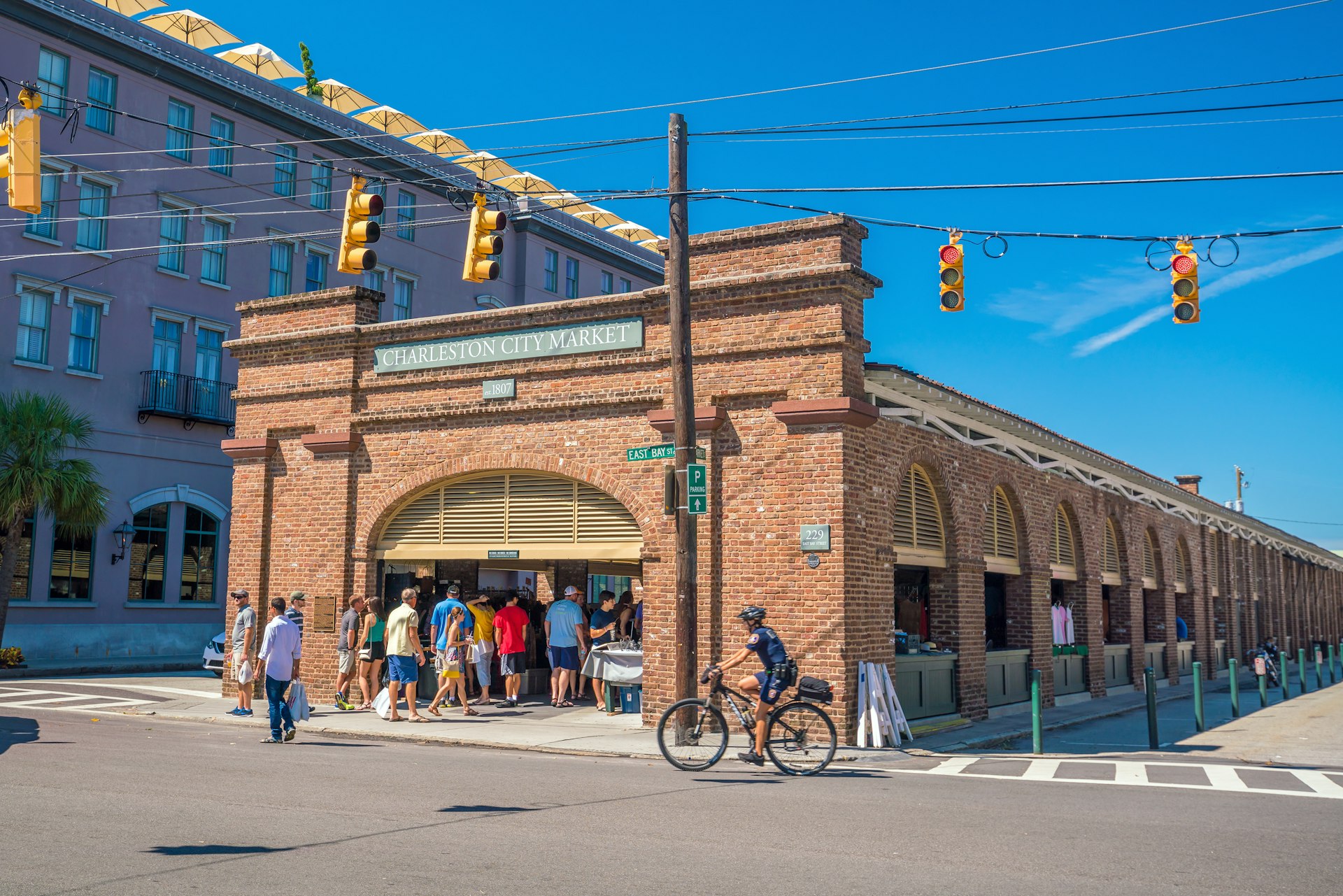 People queue to get into the historic Charleston City Market in Charleston, South Carolina. 