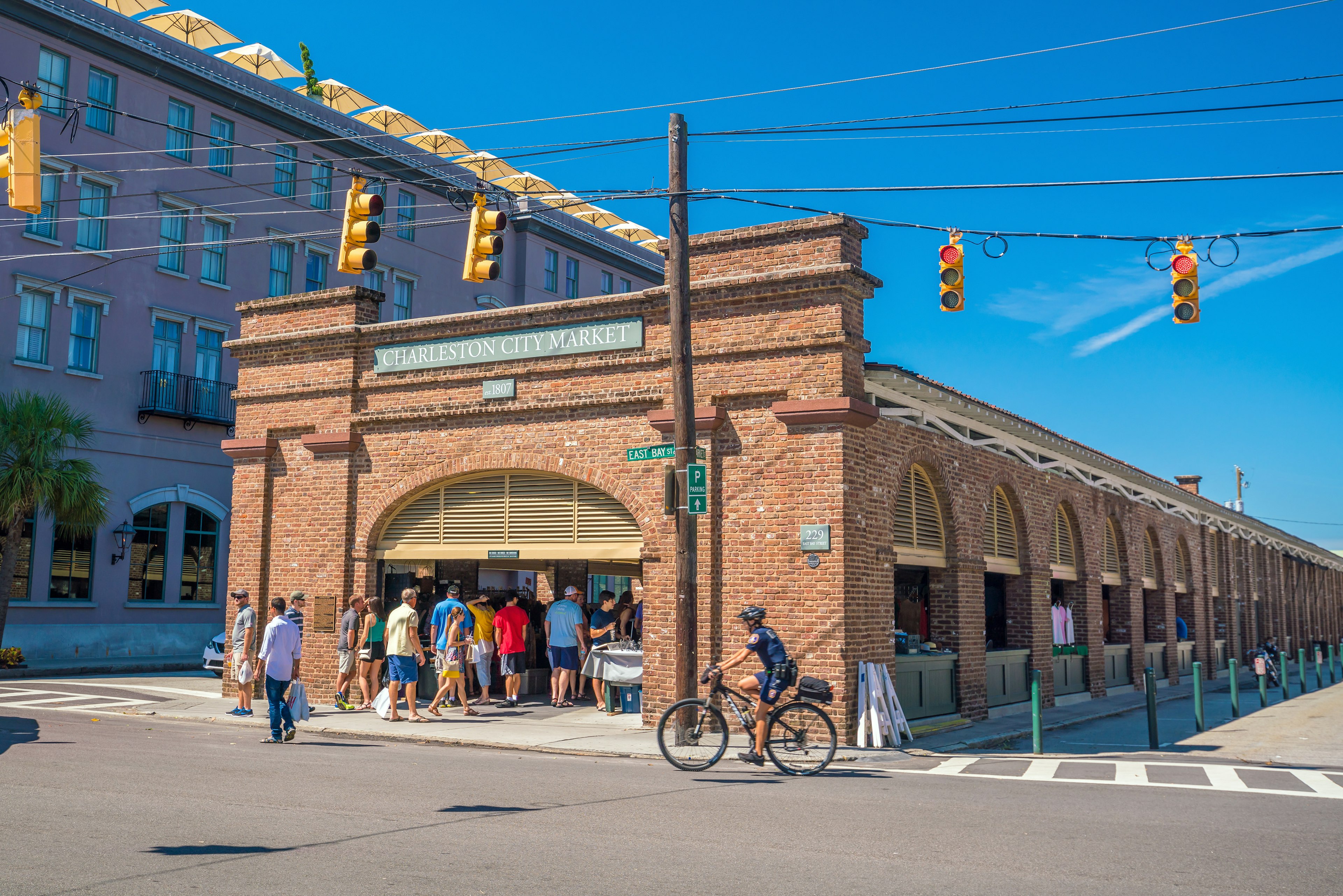 People queue to get into the historic Charleston City Market in Charleston, South Carolina.