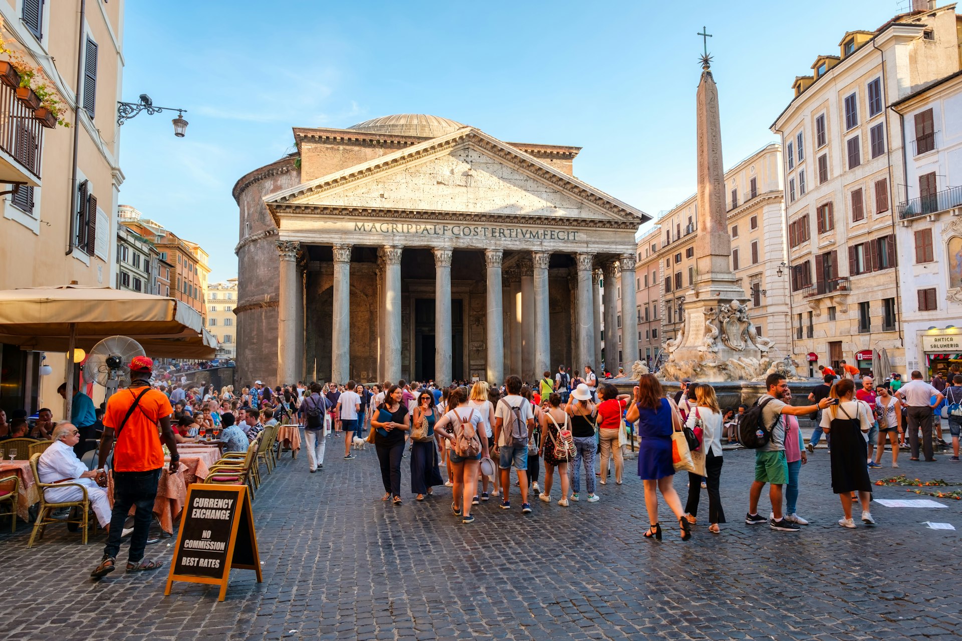 Visitors enjoy the Pantheon in Rome at sunset