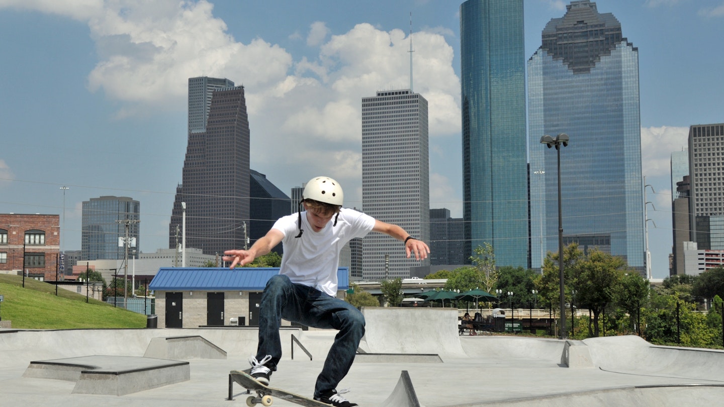 Man skakteboarding on ramp