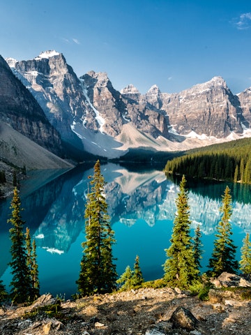 Calm lake in Rocky Mountains, Alberta, Canada