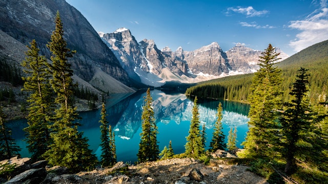Calm lake in Rocky Mountains, Alberta, Canada