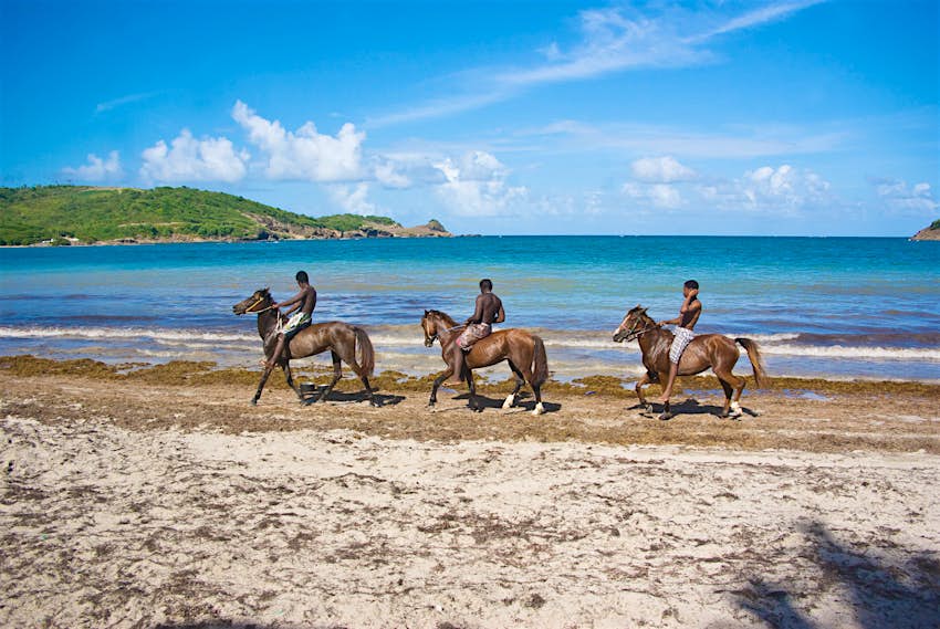 horseback riding trio on Cas En Bas beach ; beautiful afternoon