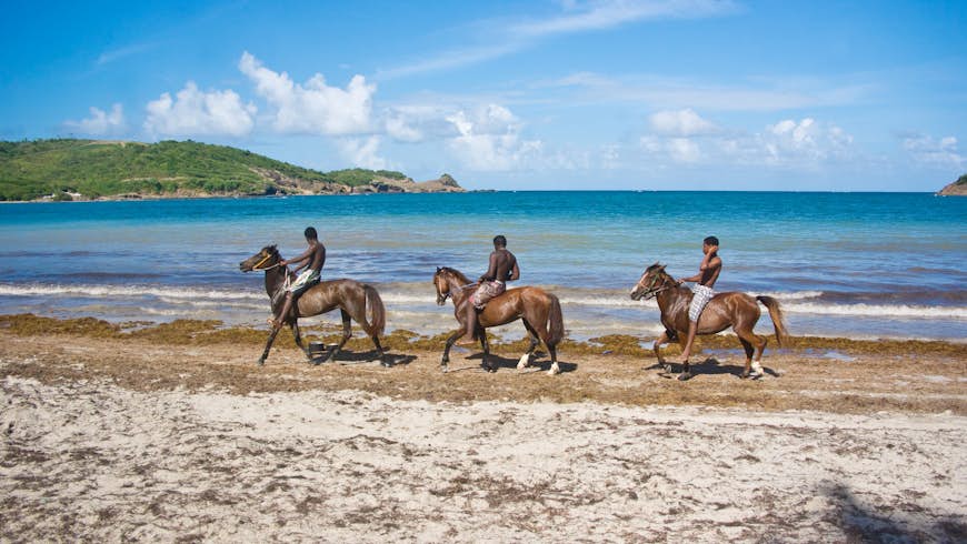 horseback riding trio on Cas En Bas beach ; beautiful afternoon