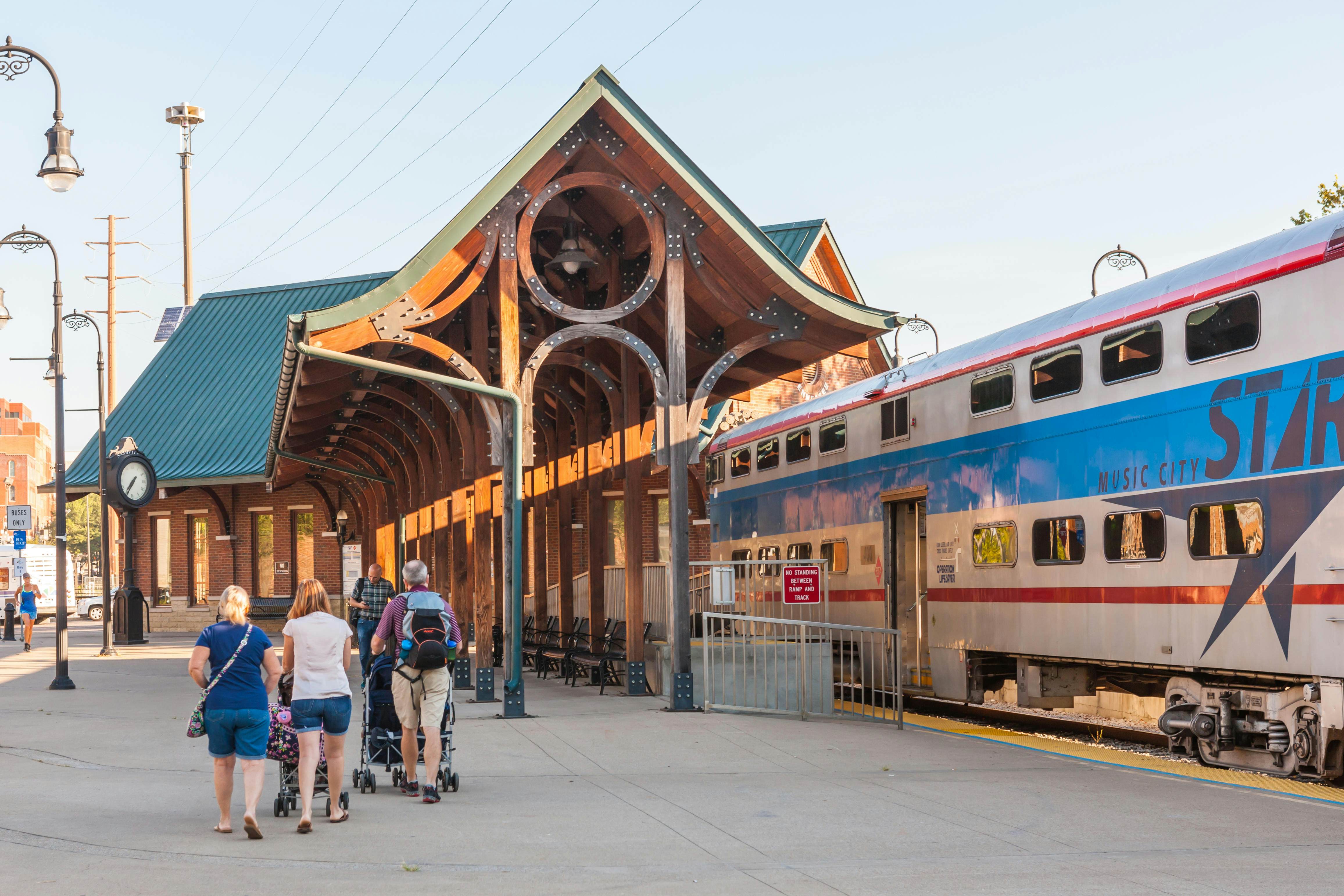 A family heads into downtown after getting off the Music City Star regional train at Riverfront Station in Nashville, Tennessee.