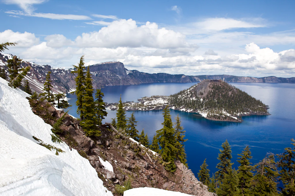 View of a snow covered island in Crater Lake, Oregon.