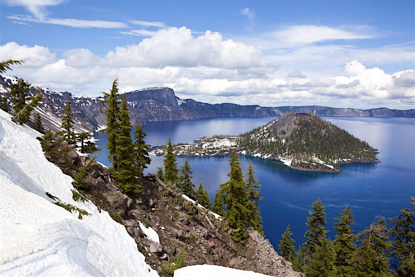 View of a snow covered island in Crater Lake, Oregon.