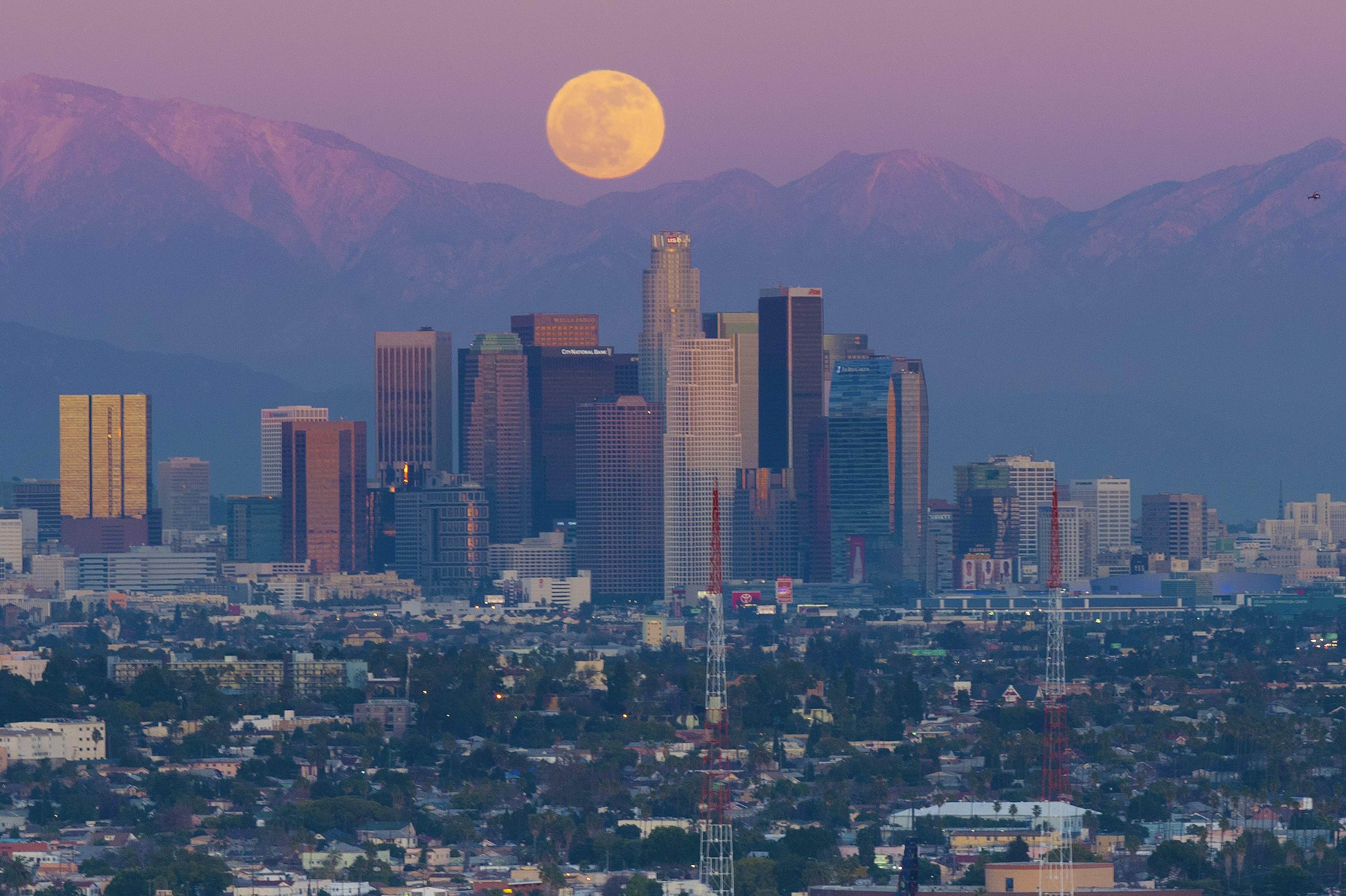 Full Moon over Los Angeles Skyline, California at Sunset