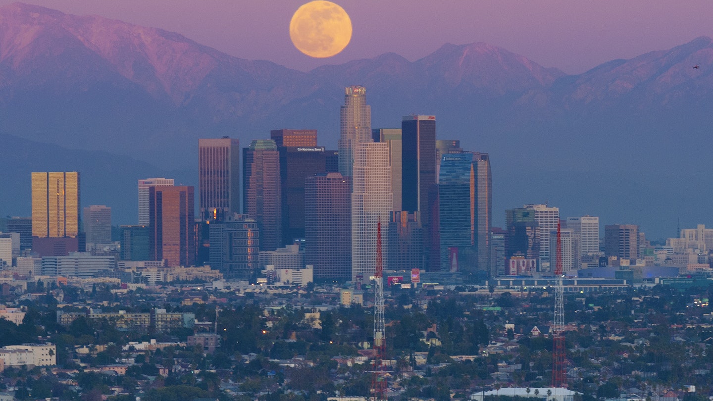 Full Moon over Los Angeles Skyline, California at Sunset