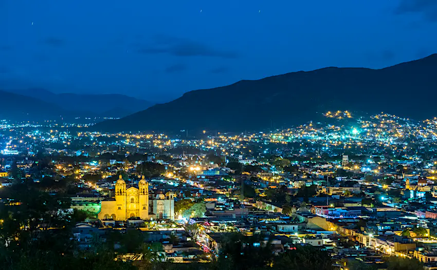 Historic centre of Oaxaca city, Mexico Historic centre of Oaxaca city lit up at night with its landmark Santo Domingo church