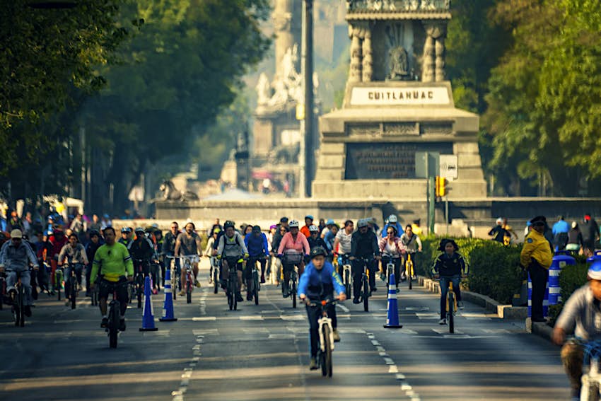 Reforma avenue in Mexico city and people in bicycles
