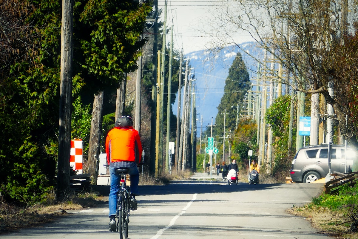 The Arbutus Greenway is transformed from historic rail corridor to a nature walkway for people to do cycling, rolling and strolling, in Vancouver BC Canada.