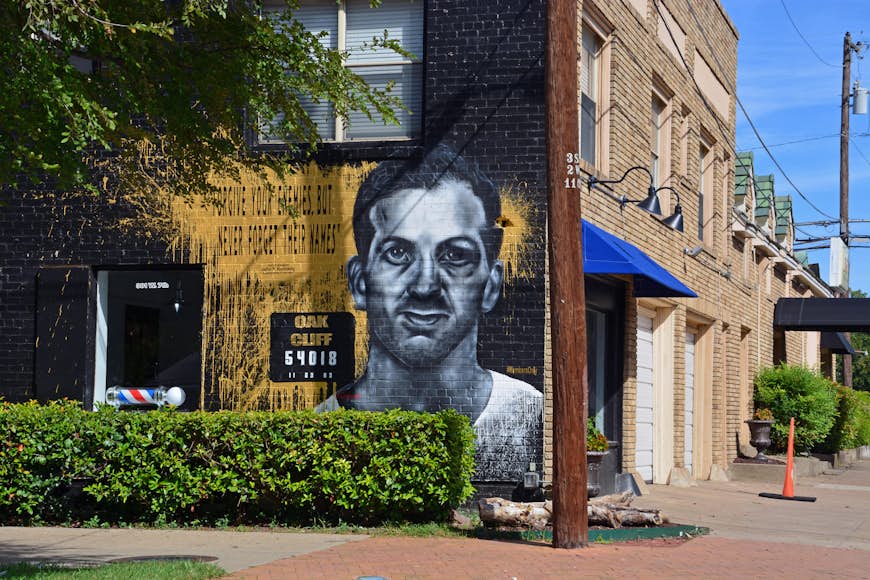 A mural is painted in the Oak Cliff, Bishop Arts District to recall Lee Harvey Oswald and his assassination of John F Kennedy.