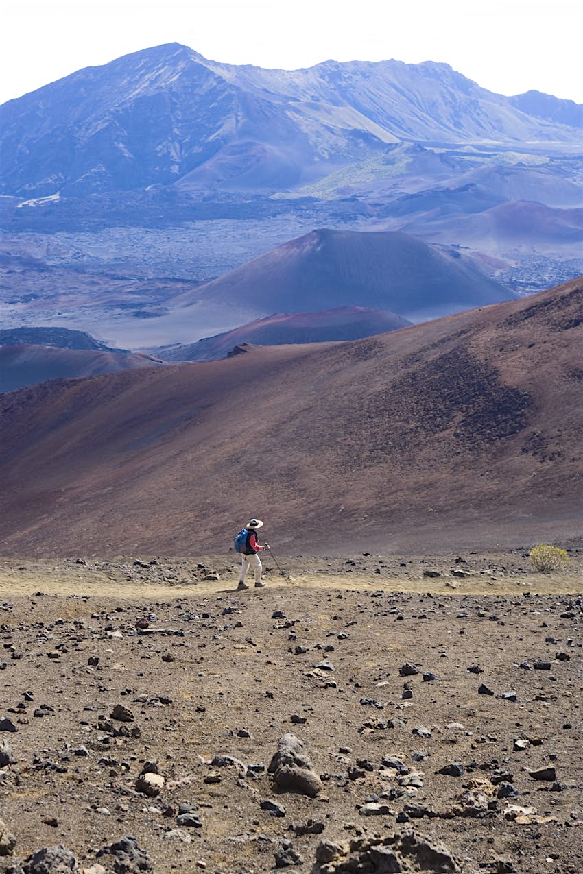 Sliding Sands Trail in Hawaii A hiker on the Sliding Sands Trail in Hawaii