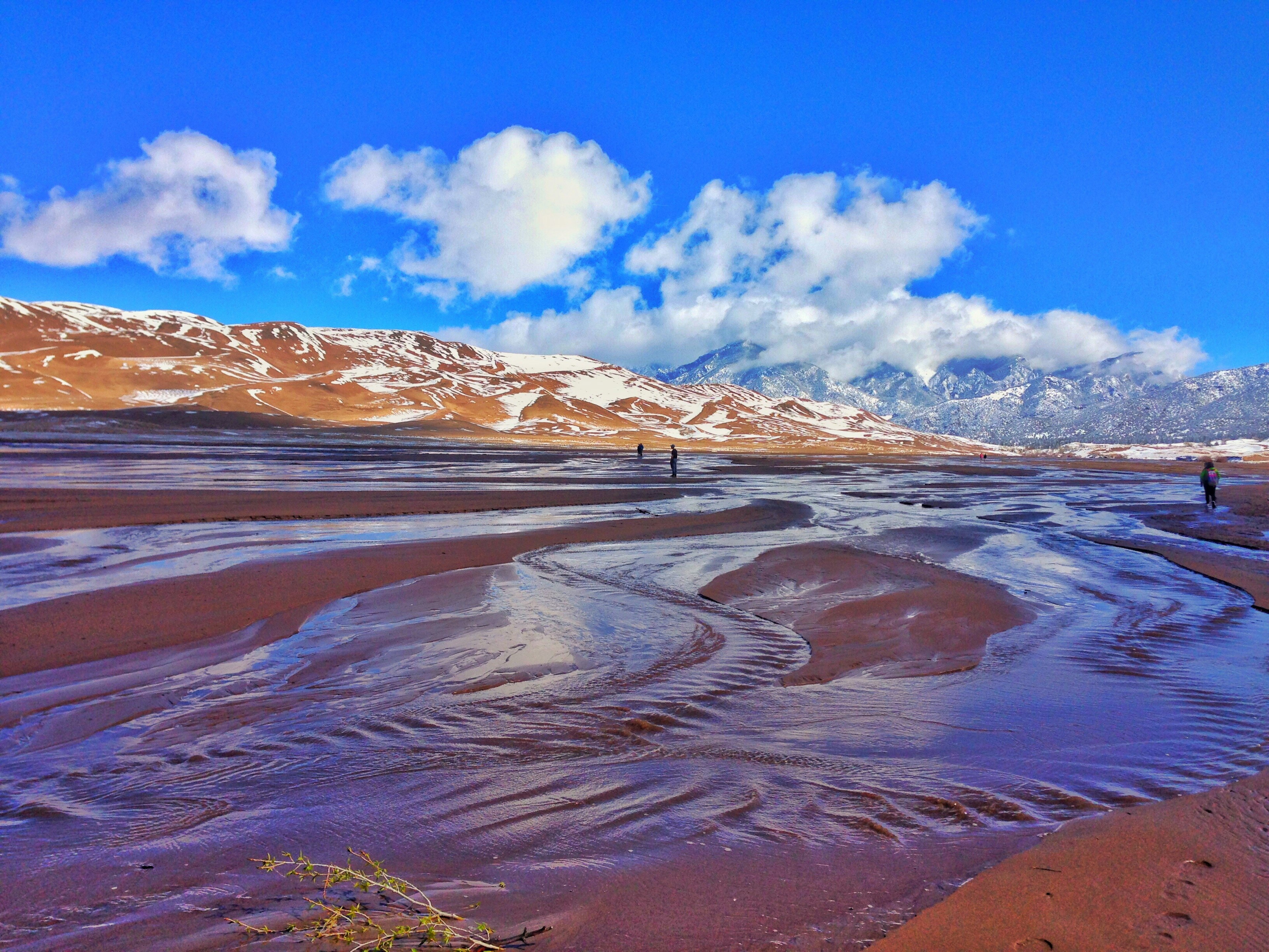 Idyllic Shot Of Stream At Great Sand Dunes National Park And Preserve Against Sky