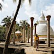 A traveller explores Ambasthala Dagaba, a stupa in Mihintale, near Anuradhapura © Ben Pipe Photography / Getty Images