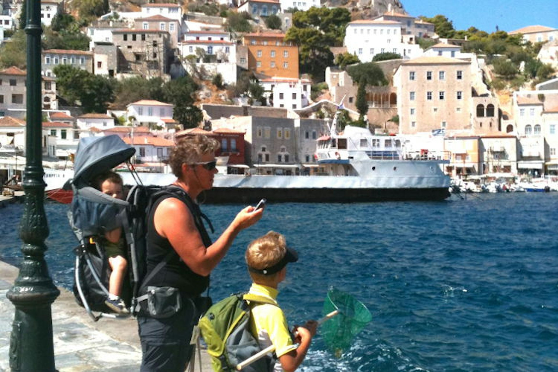 Choosing the day’s Greek adventure: swim, fish, boat ride, walk? 