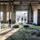 Tourists in abandoned manufacturing plant.jpg
