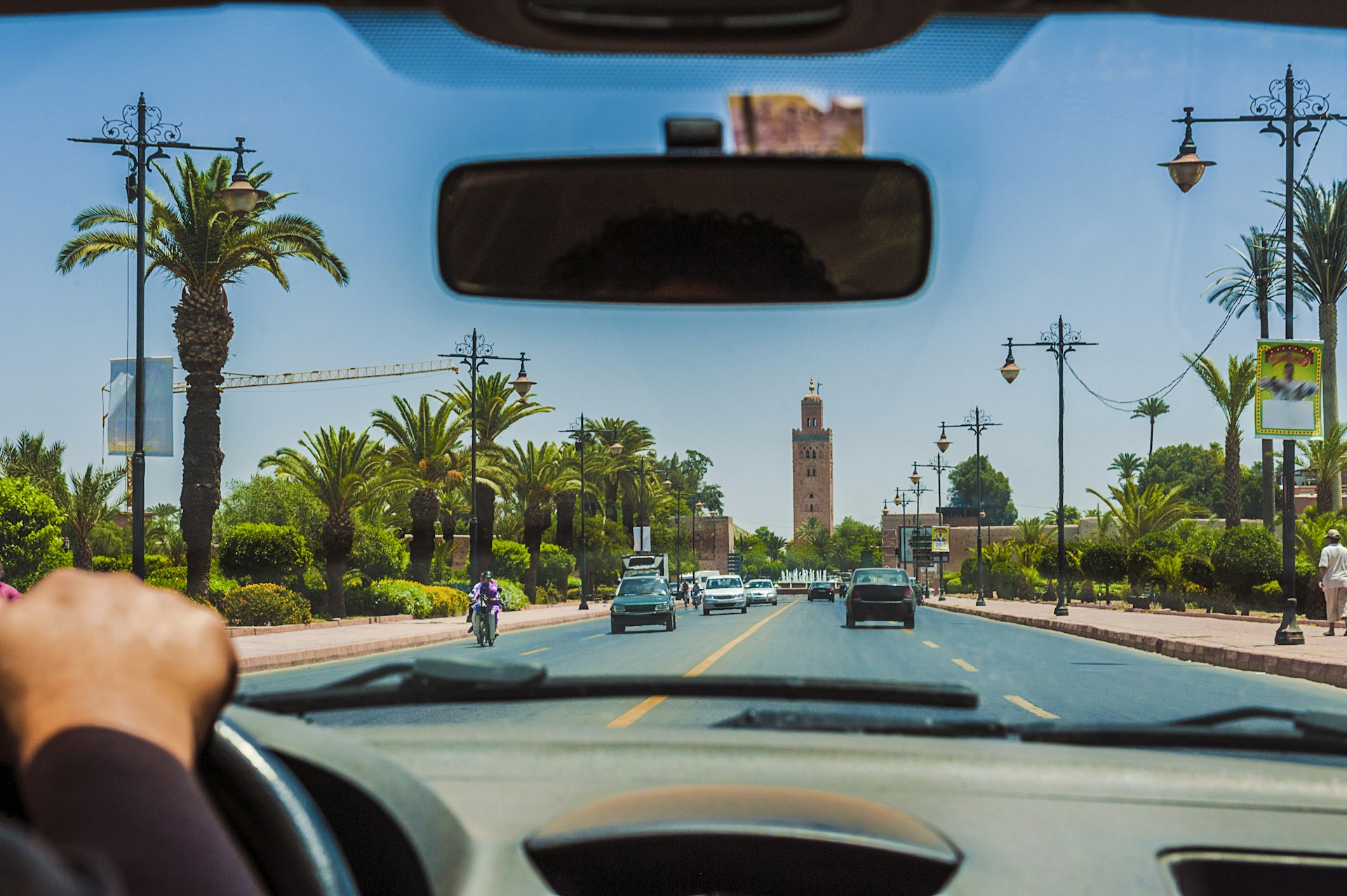 View of Koutoubia Mosque minaret from a car in Marrakesh