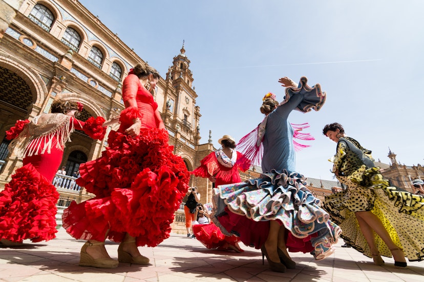 MAY 2017: Young women dance the flamenco on the Plaza de Espana.