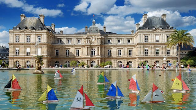 JULY 30, 2012: Model sailing boats in the pool in front of Luxembourg Palace in Luxembourg Gardens.
